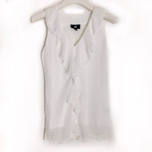 White sleeveless blouse